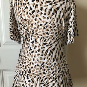 Leopard print pull over blouse.